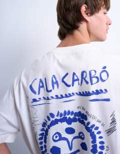 Model wearing Oversized fit t-shirt with front and back Cala Carbo print in ecru
