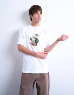 Model wearing Oversized fit t-shirt with front and back collage floral print in white