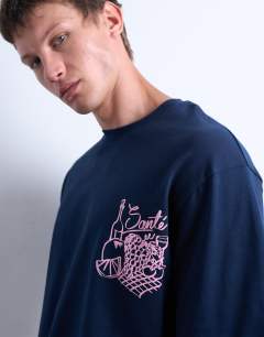 Model wearing Oversized fit t-shirt with front and back fruit and wine print in navy