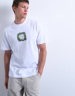 Model wearing Oversized fit t-shirt with sun doodle print and embroidery in white