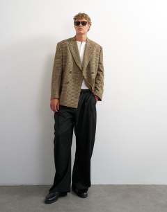 Model wearing Oversized fit textured check double breasted blazer with wool blend in brown