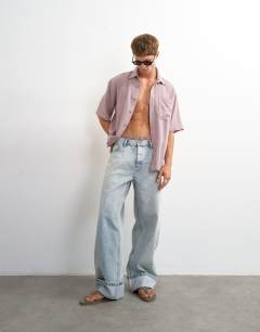 Model wearing Oversized fit textured cheesecloth short sleeve shirt in washed lilac