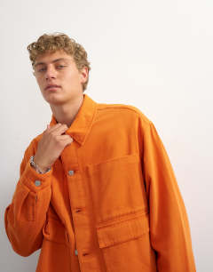 Model wearing Oversized fit twill harrington jacket in washed burnt orange