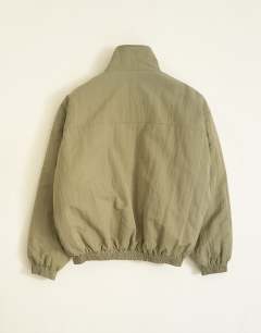 Model wearing Oversized fit twill nylon funnel neck bomber jacket in khaki