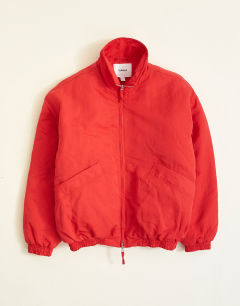 Model wearing Oversized fit twill nylon funnel neck bomber jacket in red