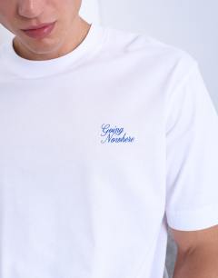 Model wearing Oversized Going Nowhere t-shirt in white
