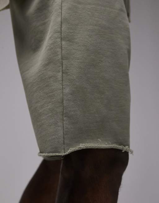 Topman oversized shorte with raw hem in washed khaki