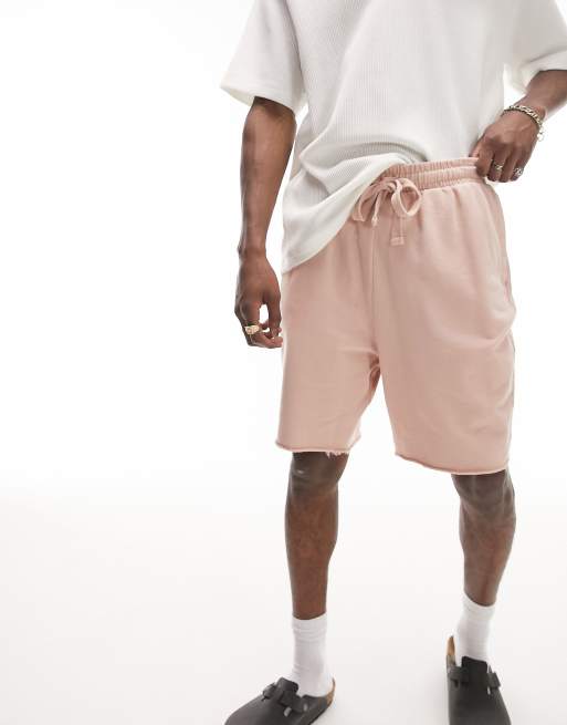 Topman oversized shorts with raw hem in washed pink
