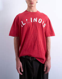 Model wearing Oversized t-shirt with Illinois front and back print in red