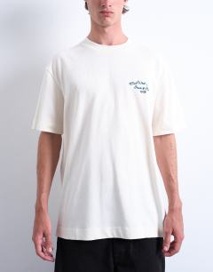 Model wearing Oversized t-shirt with Mid West League back embroidery in ecru
