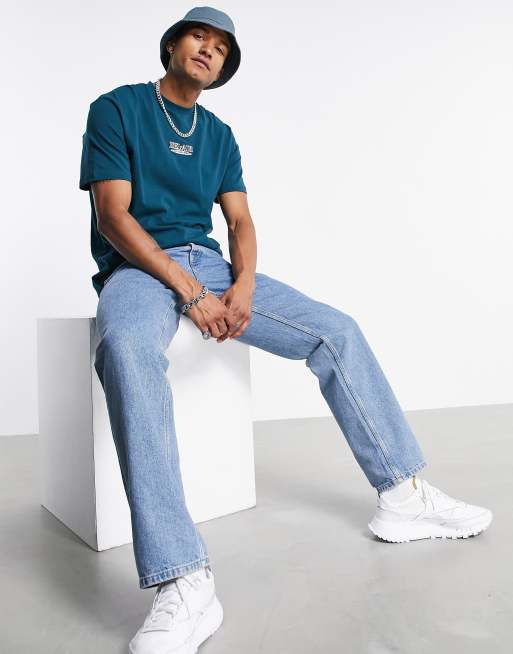 White Low Top Sneakers with Navy and Green Baseball Cap Relaxed