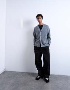 Model wearing Oversized v neck cardigan in charcoal