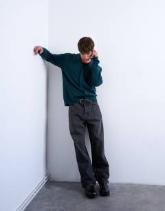Model wearing Oversized v neck cardigan in dark green