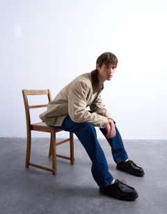 Model wearing Padded canvas jacket in washed stone