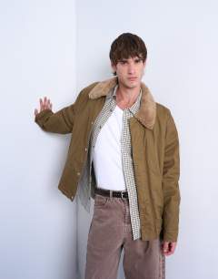 Model wearing Padded coach jacket with borg collar in stone