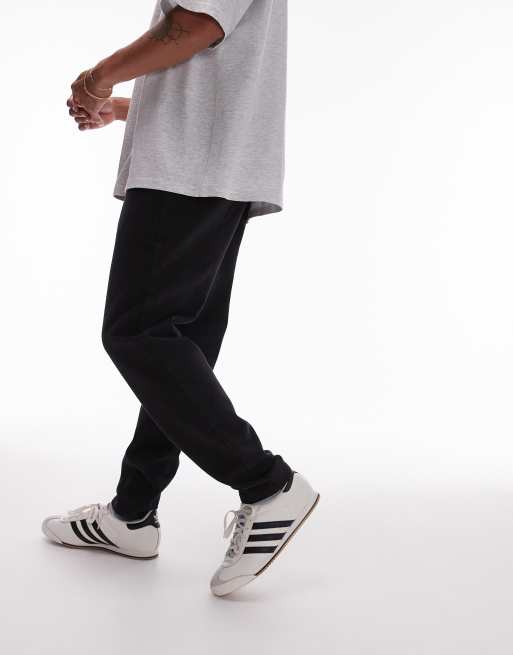 Topman - Pantaloni affusolati neri con elastico in vita