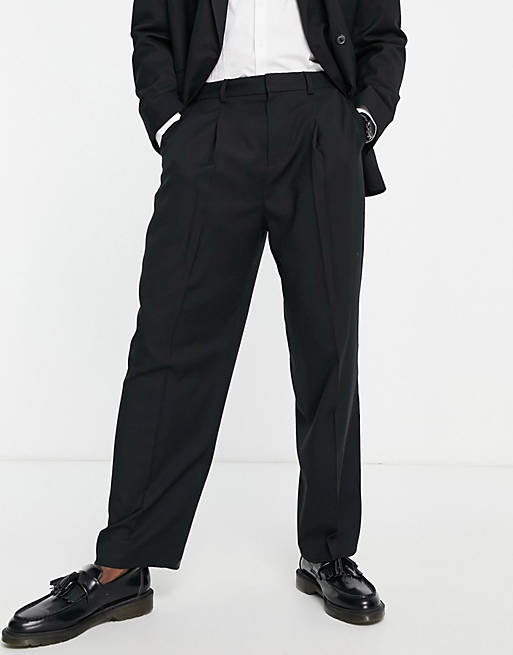 Pantaloni da abito con fondo ampio e pieghe neri Asos Uomo Abbigliamento Pantaloni e jeans Pantaloni Pantaloni a zampa 