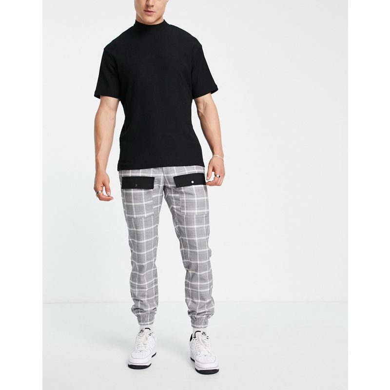 Pantaloni e chino Uomo Topman - Pantaloni skinny neri e bianchi a quadri con tasche cargo sul davanti