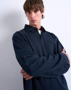 Model wearing Pinstripe button through polo in navy