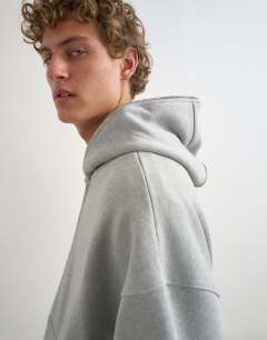 Model wearing Premium boxy fit heavyweight full zip through hoodie in grey marl