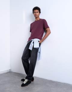 Model wearing Premium classic fit t-shirt in burgundy