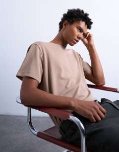 Model wearing Premium classic fit t-shirt in stone