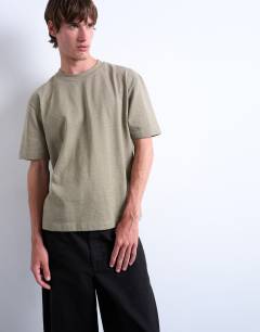 Model wearing Premium cropped fit t-shirt in khaki