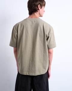 Model wearing Premium heavyweight crop fit t-shirt in khaki