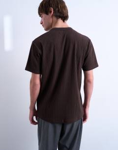 Model wearing Premium heavyweight rib tee in brown