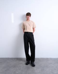 Model wearing Premium heavyweight rib tee in camel