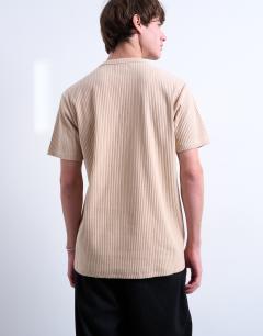 Model wearing Premium heavyweight rib tee in camel