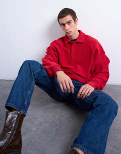 Model wearing Premium heavyweight sports polo in red