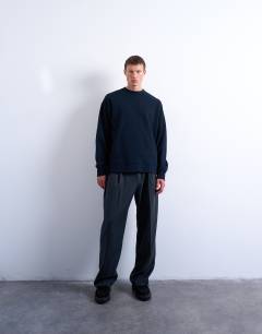 Model wearing Premium lightweight oversized fit sweatshirt in navy
