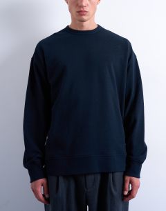 Model wearing Premium lightweight oversized fit sweatshirt in navy