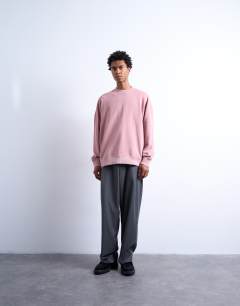 Model wearing Premium oversized drop shoulder sweatshirt in washed pink