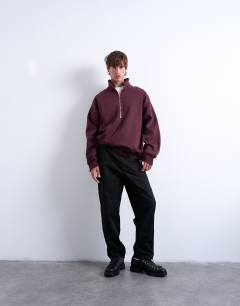 Model wearing Premium oversized fit 1/4 zip funnel neck in burgundy