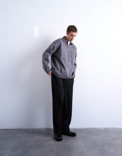 Model wearing Premium oversized fit 1/4 zip polo in grey
