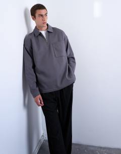 Model wearing Premium oversized fit 1/4 zip polo in grey
