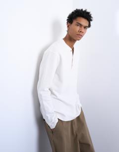 Model wearing Premium relaxed fit heavyweight waffle henley in ecru