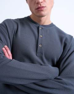 Model wearing Premium relaxed fit heavyweight waffle henley in grey