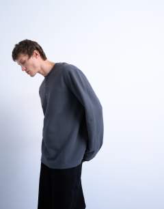 Model wearing Premium relaxed fit heavyweight waffle henley in grey