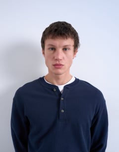 Model wearing Premium relaxed fit heavyweight waffle henley in navy