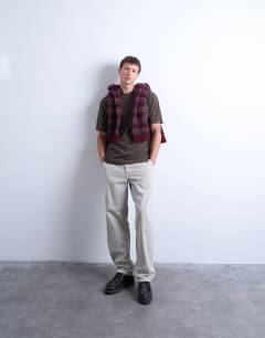 Model wearing Premium relaxed fit t-shirt with nowhere embroidery in washed brown