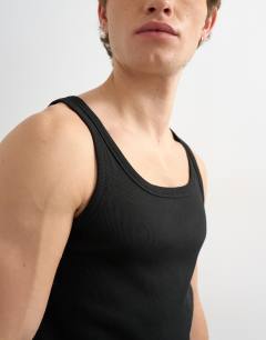 Model wearing Premium square neck ribbed vest in black
