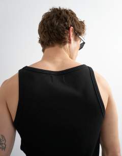 Model wearing Premium square neck ribbed vest in black