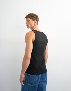 Model wearing Premium square neck ribbed vest in black