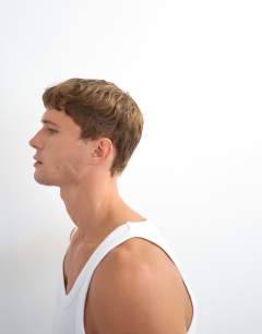 Model wearing Premium square neck ribbed vest in white