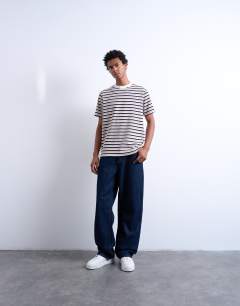 Model wearing Premium stripe navy crop fit t-shirt in stripe