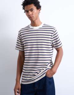 Model wearing Premium stripe navy crop fit t-shirt in stripe