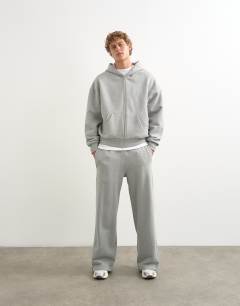 Model wearing Premium wide leg heavyweight full side zip jogger in grey marl